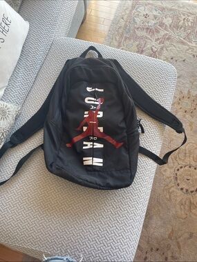 Jordan Black Backpack with Red Jumpman and White Lettering